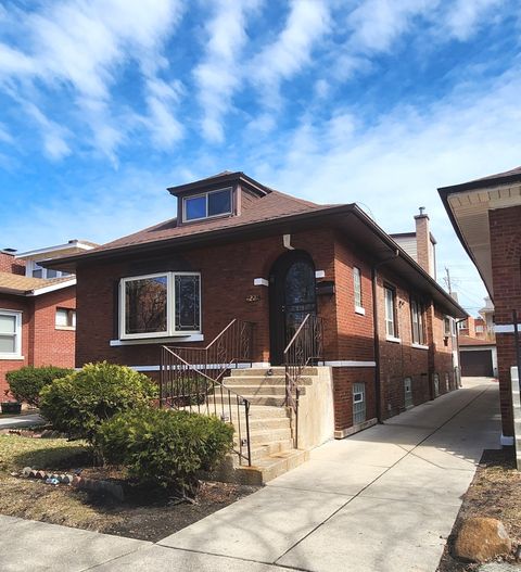 Photo of 7227 S Bennett Avenue, Chicago, IL 60649 (MLS # 12370514)