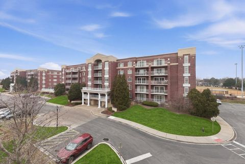 Photo of 7081 W Touhy Avenue #407, Niles, IL 60714 (MLS # 12642965)