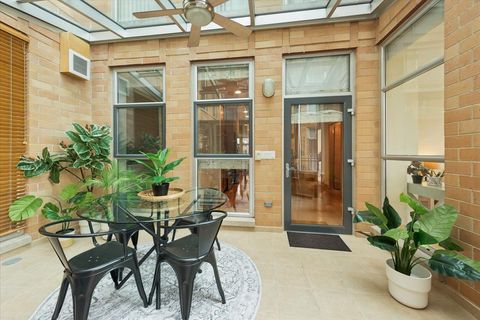 Tiny photo for 1572 Maple Avenue #302, Evanston, IL 60201 (MLS # 12634112)