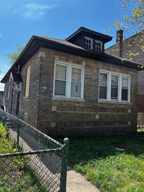 Photo of 1535 E 74th Place, Chicago, IL 60619 (MLS # 12622390)