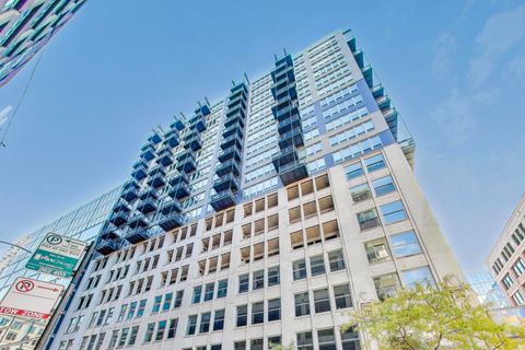 Photo of 565 W Quincy Street #801, Chicago, IL 60661 (MLS # 12622503)