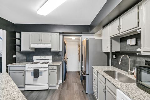 Tiny photo for 1941 Quaker Hollow Lane #1941, Streamwood, IL 60107 (MLS # 12530358)