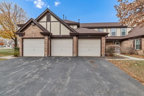 Photo of 1941 Quaker Hollow Lane #1941, Streamwood, IL 60107 (MLS # 12530358)