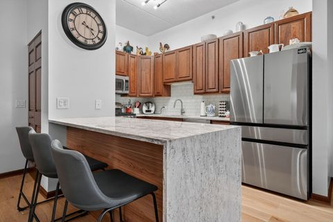 Tiny photo for 9355 Irving Park Road #122, Schiller Park, IL 60176 (MLS # 12593584)