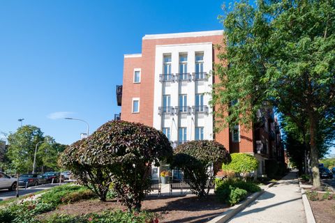 Photo of 1075 W ROOSEVELT Road #201, Chicago, IL 60608 (MLS # 12480863)