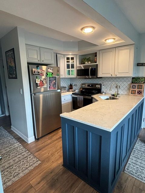 Photo of 5516 E Lake Drive #92-D, Lisle, IL 60532 (MLS # 12599896)