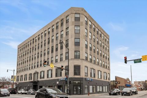 Photo of 1791 W Howard Street #405, Chicago, IL 60626 (MLS # 12582362)