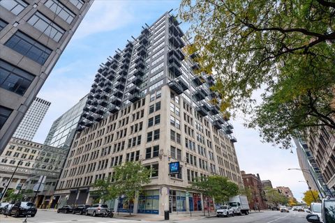 Photo of 565 W Quincy Street #1202, Chicago, IL 60661 (MLS # 12512894)