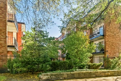 Photo of 6961 N Oakley Avenue #210, Chicago, IL 60645 (MLS # 12508158)