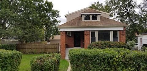 Photo of 1103 W 104th Place, Chicago, IL 60643 (MLS # 12212525)