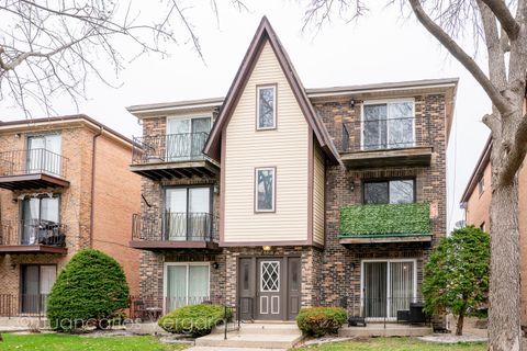 Photo of 6616 W 64th Place #1E, Chicago, IL 60638 (MLS # 12611646)