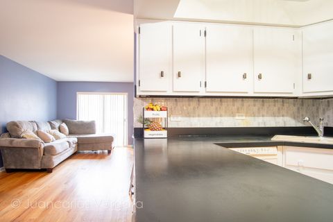 Tiny photo for 6616 W 64th Place #1E, Chicago, IL 60638 (MLS # 12611646)