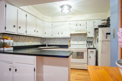 Tiny photo for 6616 W 64th Place #1E, Chicago, IL 60638 (MLS # 12611646)