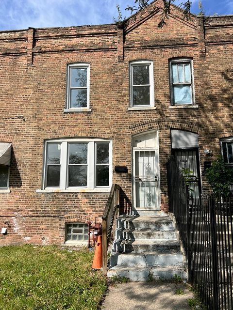 Photo of 10614 S Langley Avenue #10614, Chicago, IL 60628 (MLS # 12401727)