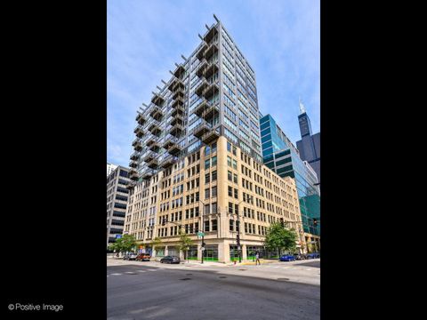 Photo of 565 W QUINCY Street #1602, Chicago, IL 60661 (MLS # 12612091)