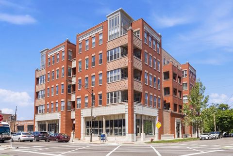 Photo of 2700 W Belmont Avenue #403, Chicago, IL 60618 (MLS # 12660090)