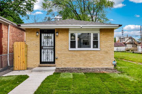 Photo of 337 W 106th Place, Chicago, IL 60628 (MLS # 12455678)