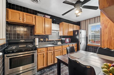 Tiny photo for 1418 N Waller Avenue N, Chicago, IL 60651 (MLS # 12631899)