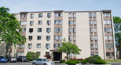Photo of 9720 S PULASKI Road #306, Oak Lawn, IL 60453 (MLS # 12562991)