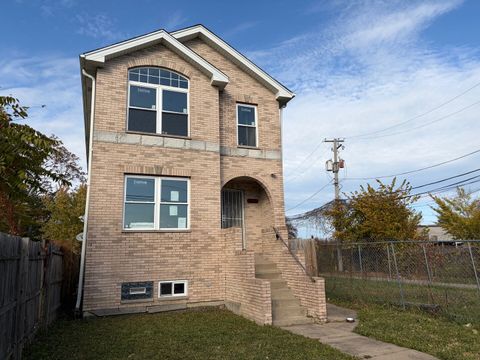 Photo of 850 W 86th Place, Chicago, IL 60620 (MLS # 12519591)