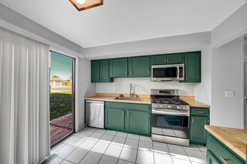 Tiny photo for 1335 GIFFORD Court #A, Hanover Park, IL 60133 (MLS # 12505441)