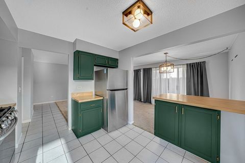 Tiny photo for 1335 GIFFORD Court #A, Hanover Park, IL 60133 (MLS # 12505441)