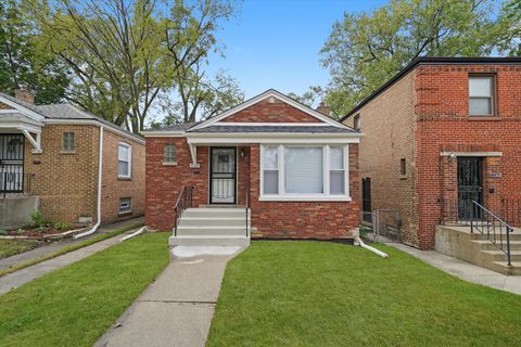 Photo of 9728 S Greenwood Avenue, Chicago, IL 60628 (MLS # 12494393)