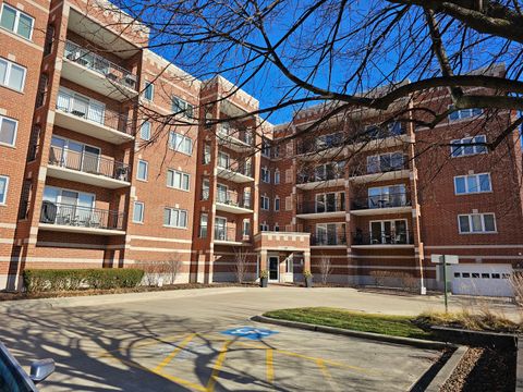 Photo of 405 W Front Street #3-207, Wheaton, IL 60187 (MLS # 12572257)