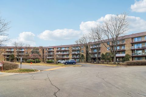 Photo of 5450 Astor Lane #104, Rolling Meadows, IL 60008 (MLS # 12547911)