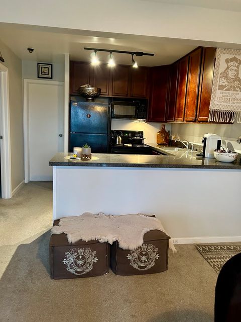 Tiny photo for 5811 Oakwood Drive #F, Lisle, IL 60532 (MLS # 12694600)