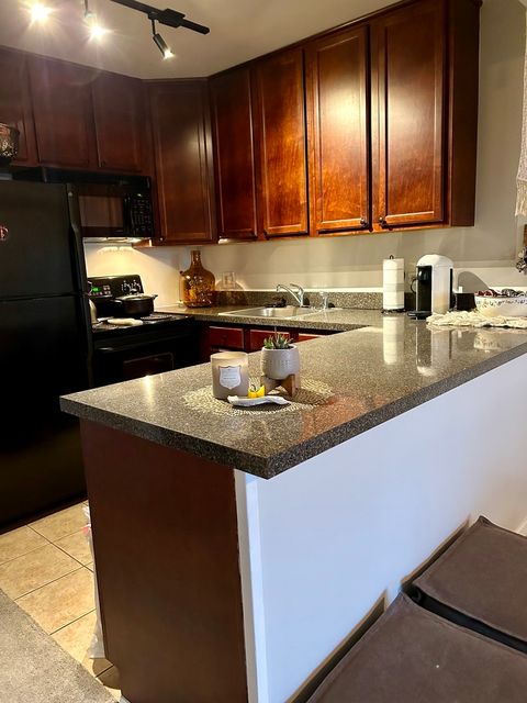 Tiny photo for 5811 Oakwood Drive #F, Lisle, IL 60532 (MLS # 12694600)