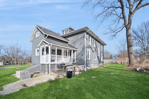 Photo of 9 Center Road, Streamwood, IL 60107 (MLS # 12603394)