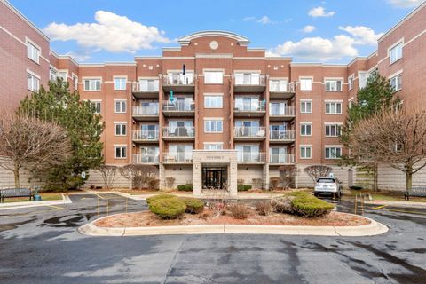 Photo of 6559 W George Street #309, Chicago, IL 60634 (MLS # 12686033)