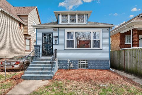 Photo of 11945 S Yale Avenue, Chicago, IL 60628 (MLS # 12628775)