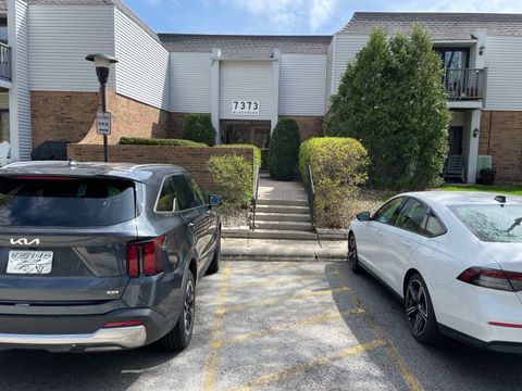 Photo of 7373 Blackburn Avenue #104, Downers Grove, IL 60516 (MLS # 12619512)