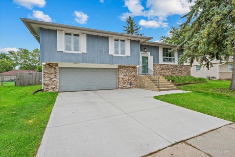 Tiny photo for 813 Krause Avenue, Streamwood, IL 60107 (MLS # 12722082)