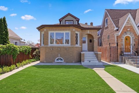 Photo of 5853 W Newport Avenue, Chicago, IL 60634 (MLS # 12630762)