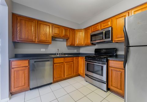 Tiny photo for 703 E Fullerton Avenue #107, Glendale Heights, IL 60139 (MLS # 12529974)