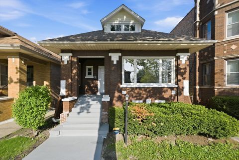 Photo of 8219 S Throop Street, Chicago, IL 60620 (MLS # 12628219)