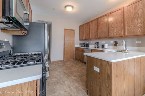 Tiny photo for 201 Barrett Drive #A, Yorkville, IL 60560 (MLS # 12587463)