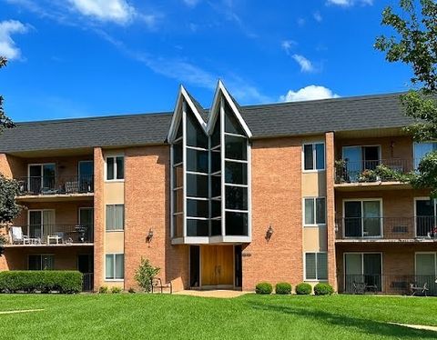 Photo of 1056 N Mill Street #306, Naperville, IL 60563 (MLS # 12468115)