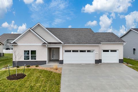 Photo of 606 KEVIN Road, Blue Grass, IA 52726 (MLS # QC4269219)