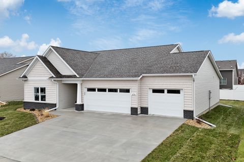 Photo of 606 KEVIN Road, Blue Grass, IA 52726 (MLS # QC4269219)