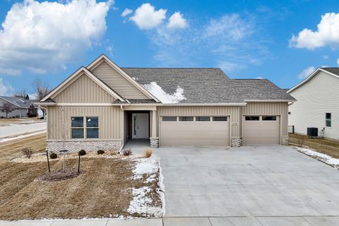 Photo of 606 KEVIN Road, Blue Grass, IA 52726 (MLS # QC4269219)