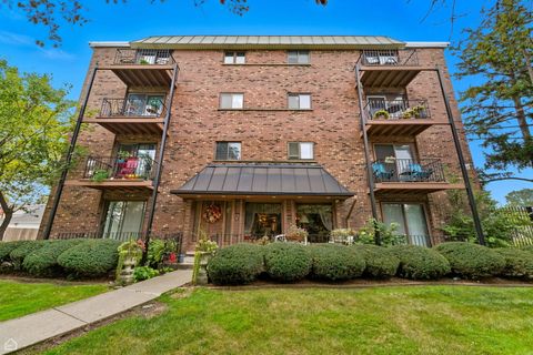 Photo of 2218 N Newland Avenue #203, Chicago, IL 60707 (MLS # 12495084)