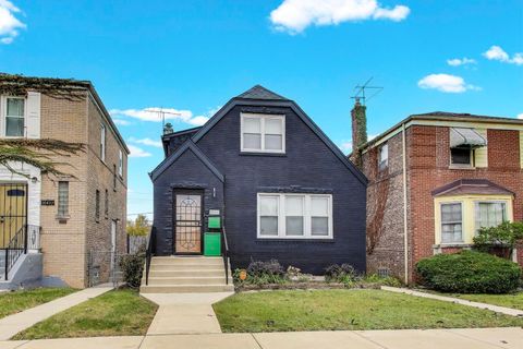 Photo of 10441 S Prairie Avenue, Chicago, IL 60628 (MLS # 12502442)