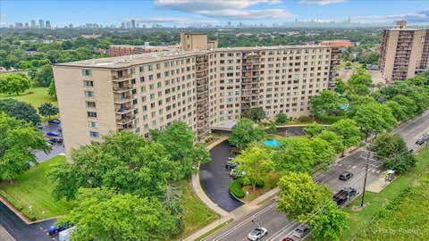 Photo of 6933 N Kedzie Avenue #405, Chicago, IL 60645 (MLS # 12720740)