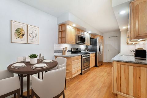 Tiny photo for 1112 Iroquois Avenue #12, Naperville, IL 60563 (MLS # 12597109)