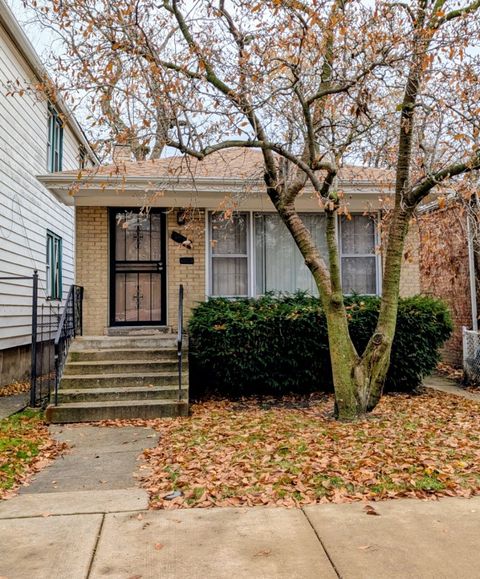 Photo of 7935 S East End Avenue, Chicago, IL 60617 (MLS # 12524497)
