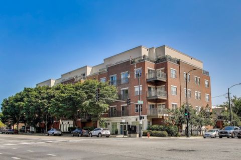 Photo of 1155 W Roosevelt Road #412, Chicago, IL 60608 (MLS # 12490410)